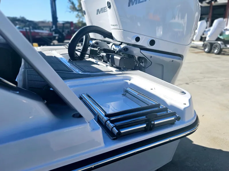 Slide: The Image of 2025 Monterey Elite 30 OB boat with sleek design and modern features. - 12