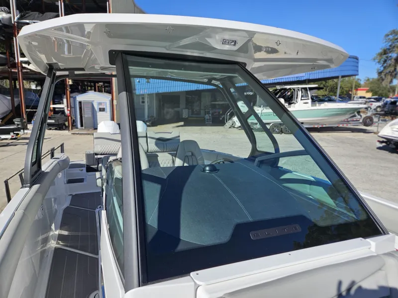 Slide: The Image of 2025 Monterey Elite 30 OB boat with sleek design and spacious interior. - 35