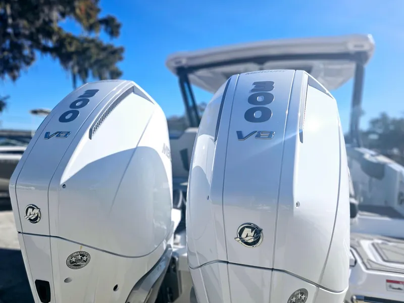Slide: The Image of Twin 300 V8 outboard engines on 2025 Monterey Elite 30 OB boat. - 4