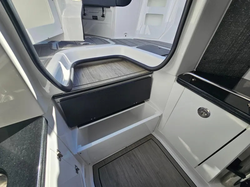 Slide: The Image of Interior view of 2025 Monterey Elite 30 OB boat, featuring sleek design and modern finishes. - 47