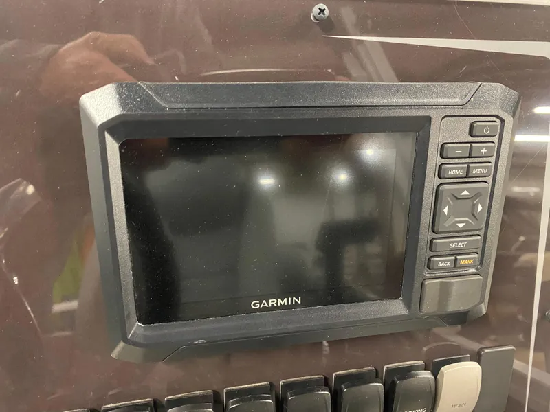 Slide: The Image of Garmin display on 2025 SunCatcher Fusion 324SS boat dashboard. - 17