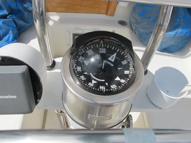 Slide: The Image of Compass on 1987 Pacific Seacraft PS37 sailboat cockpit. - 21