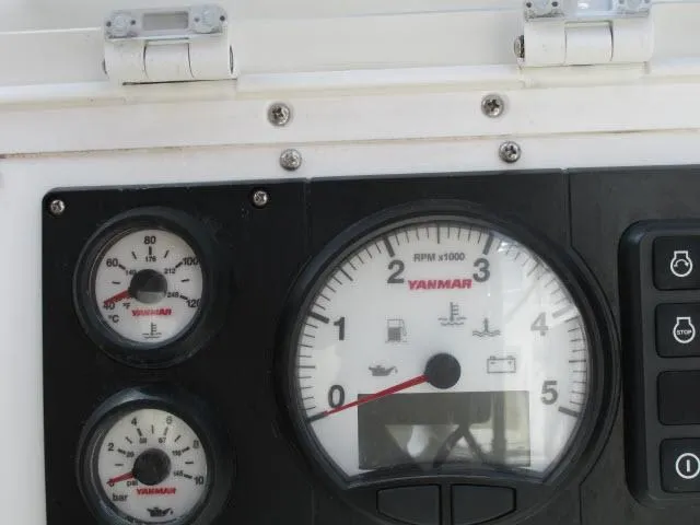 Slide: The Image of Yanmar engine gauges on a 1987 Pacific Seacraft PS37 sailboat. - 24