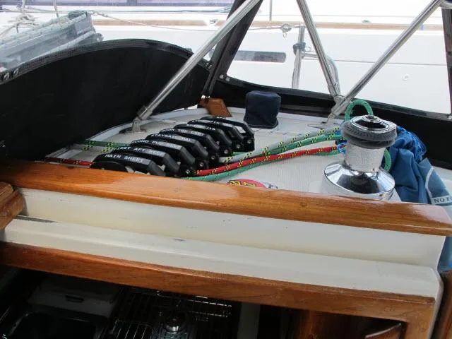 Slide: The Image of Cockpit of 1987 Pacific Seacraft PS37 sailboat with winch and colorful ropes. - 27
