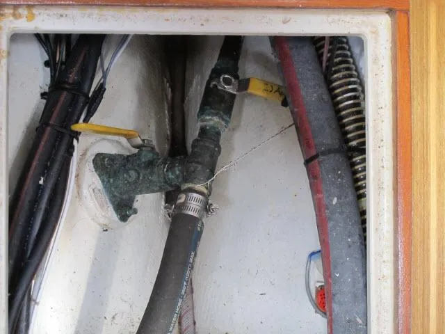 Slide: The Image of 1987 Pacific Seacraft PS37 boat plumbing and wiring system close-up. - 40