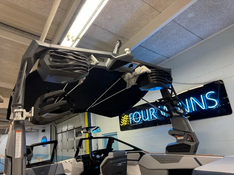 Slide: The Image of 2025 Nautique Super Air Nautique S21 boat interior with advanced sound system. - 20