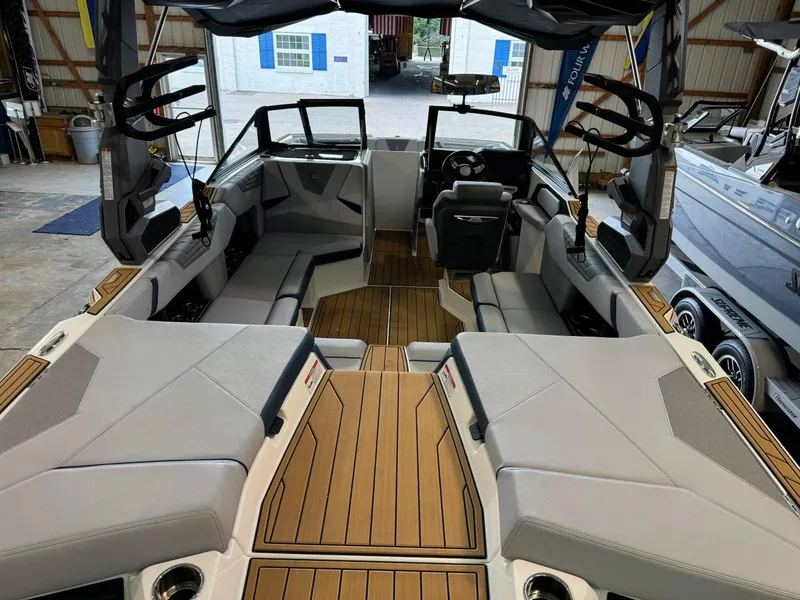 Slide: The Image of 2025 Nautique Super Air Nautique S21 interior with sleek seating and modern design. - 3