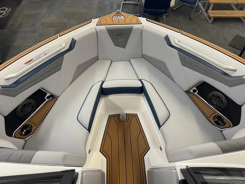 Slide: The Image of 2025 Nautique Super Air Nautique S21 boat interior with luxurious seating and modern design. - 30