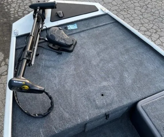 Slide: The Image of 2025 Tracker Bass Tracker Classic XL boat deck with trolling motor. - 6