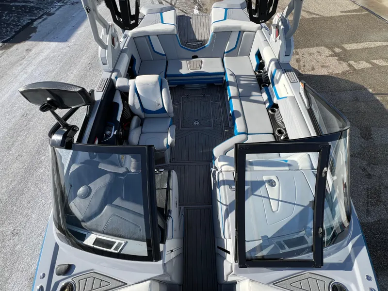 Slide: The Image of 2020 Nautique G21 boat interior with sleek seating and modern design. - 30
