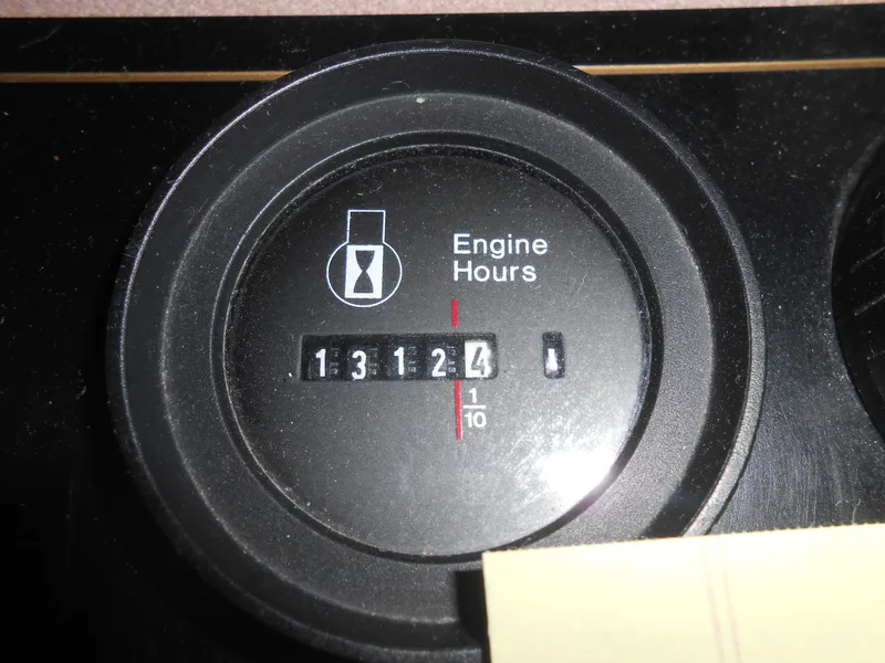 Slide: The Image of Lakeview 5516 engine hour meter showing 1312.4 hours, 1998 model. - 15
