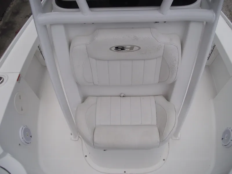 Slide: The Image of 2019 Sea Hunt BX 22 BR boat seating area, white upholstery. - 15