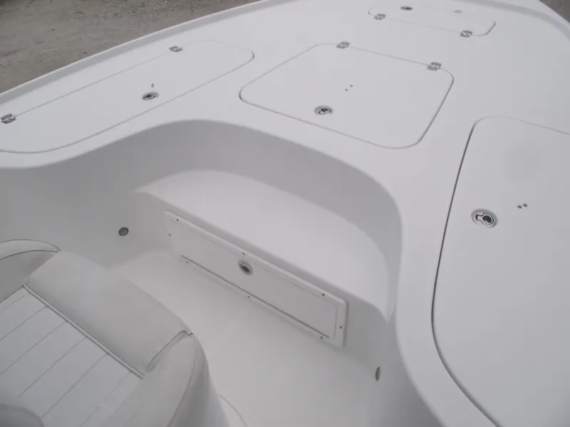 Slide: The Image of 2019 Sea Hunt BX 22 BR boat deck with storage compartments and seating. - 19