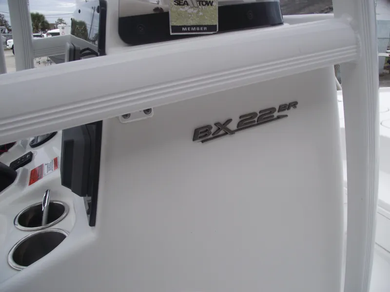 Slide: The Image of 2019 Sea Hunt BX 22 BR boat console with cup holders and branding. - 20