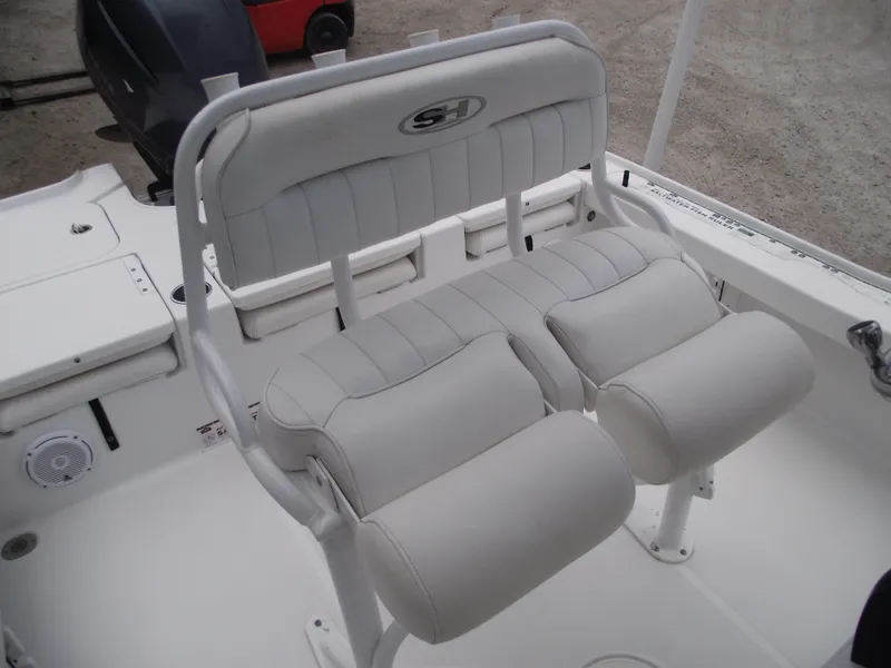 Slide: The Image of 2019 Sea Hunt BX 22 BR boat seating with cushioned white upholstery. - 25