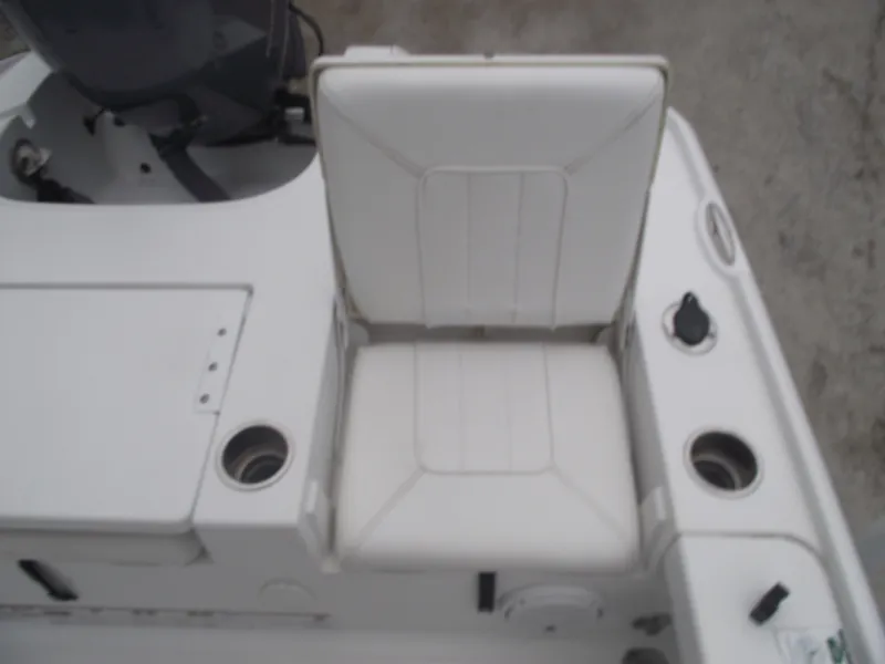 Slide: The Image of 2019 Sea Hunt BX 22 BR boat seat with cup holders and storage. - 32