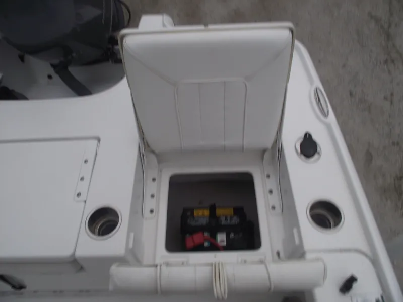 Slide: The Image of 2019 Sea Hunt BX 22 BR boat seat with storage compartment open. - 33
