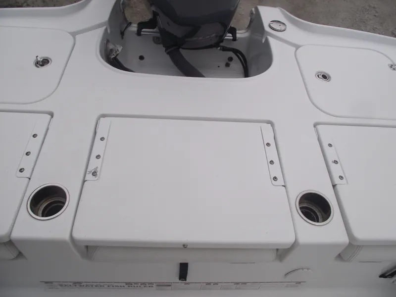 Slide: The Image of 2019 Sea Hunt BX 22 BR boat deck with storage compartments and cup holders. - 34