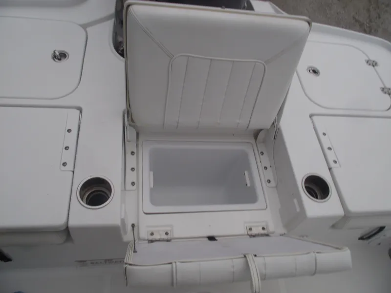 Slide: The Image of 2019 Sea Hunt BX 22 BR boat seat with built-in storage compartment. - 36