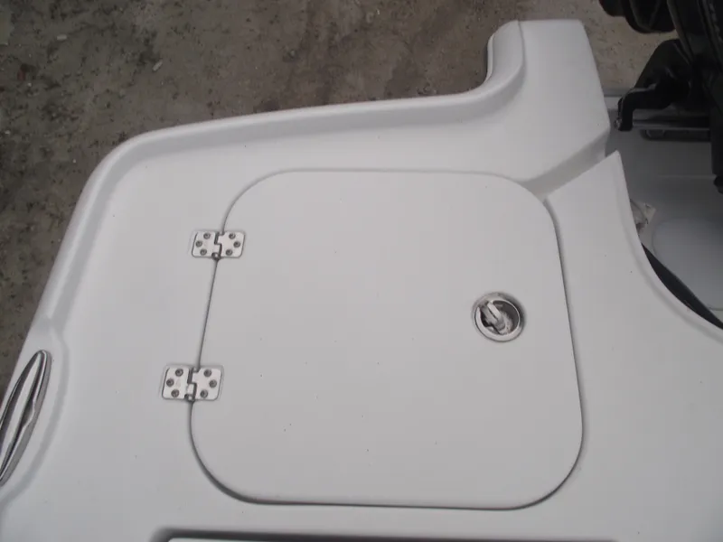 Slide: The Image of 2019 Sea Hunt BX 22 BR boat hatch with metal hinges and latch. - 37