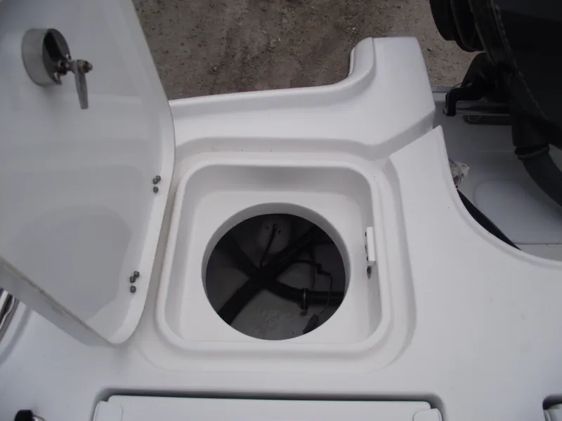 Slide: The Image of 2019 Sea Hunt BX 22 BR boat storage compartment with open hatch. - 38