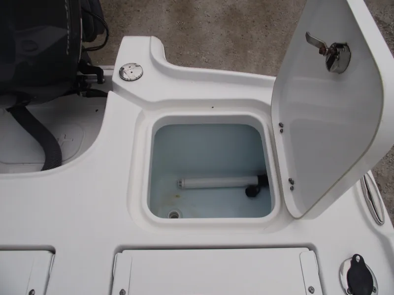Slide: The Image of Open storage compartment on 2019 Sea Hunt BX 22 BR boat. - 41