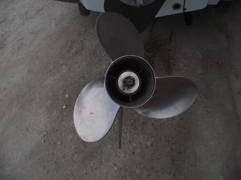 Slide: The Image of Propeller of 2019 Sea Hunt BX 22 BR boat on gravel surface. - 5