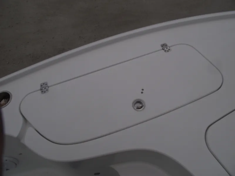 Slide: The Image of 2019 Sea Hunt BX 22 BR boat deck with storage compartment. - 9