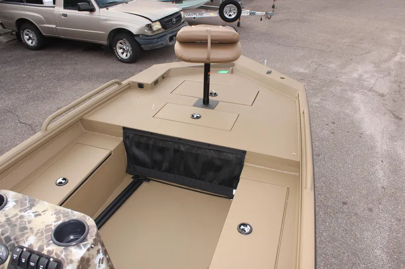 Slide: The Image of 2025 Excel 1860 F4 Shallow Water boat interior with seating and storage compartments. - 15