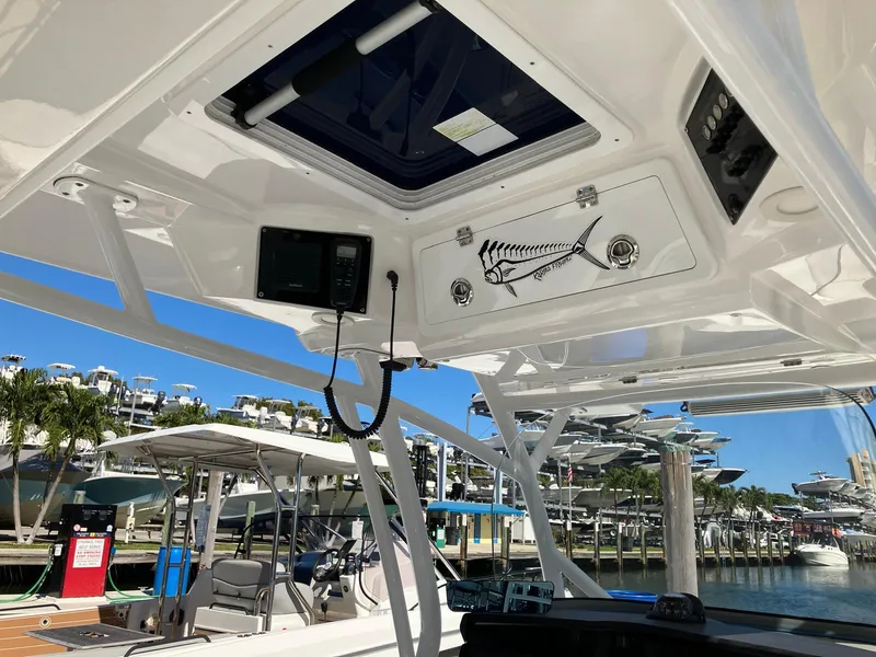 Slide: The Image of Interior view of 2021 Sea Fox 328 Commander boat at marina. - 14