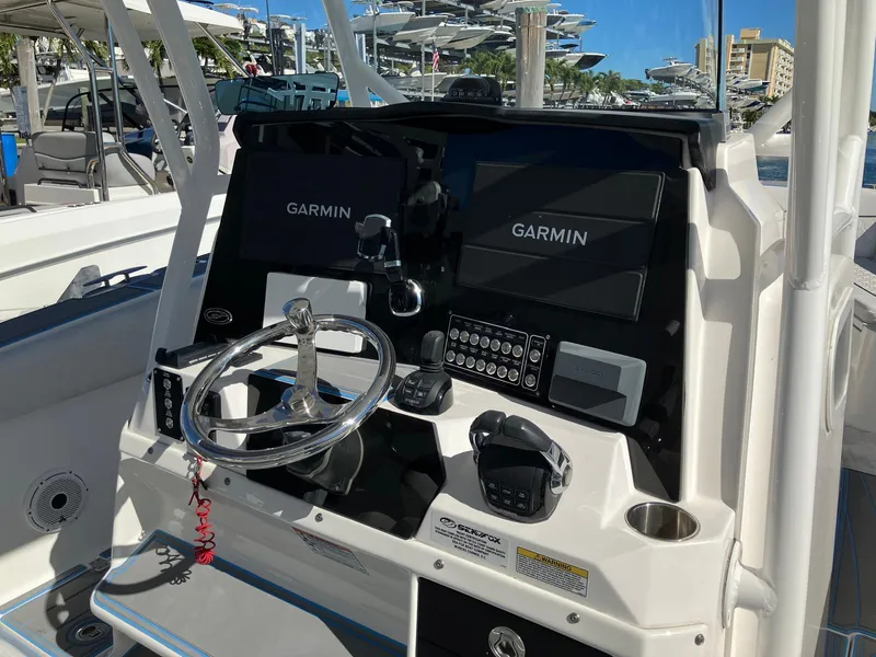 Slide: The Image of 2021 Sea Fox 328 Commander helm with Garmin navigation displays. - 15
