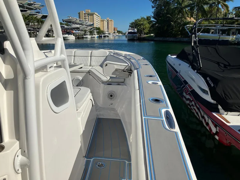 Slide: The Image of 2021 Sea Fox 328 Commander boat docked in a scenic marina. - 24