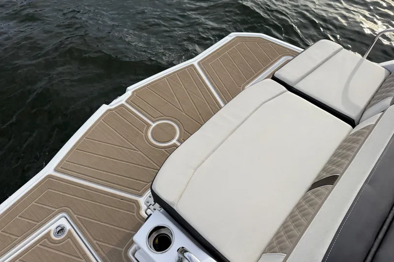 Slide: The Image of Luxury seating on 2025 Monterey M6 boat with stylish deck design. - 17