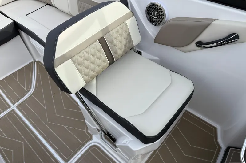 Slide: The Image of 2025 Monterey M6 boat seat with beige and white upholstery, featuring diamond stitching and modern design. - 23