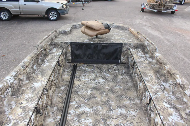Slide: The Image of 2025 Excel 1860 F4 Shallow Water boat with camouflage design and seating. - 11