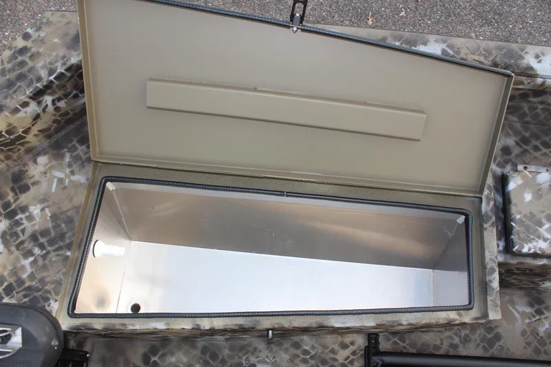 Slide: The Image of Open storage compartment in 2025 Excel 1860 F4 Shallow Water boat. - 12