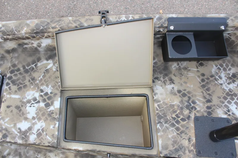 Slide: The Image of Open storage compartment on 2025 Excel 1860 F4 Shallow Water boat. - 13