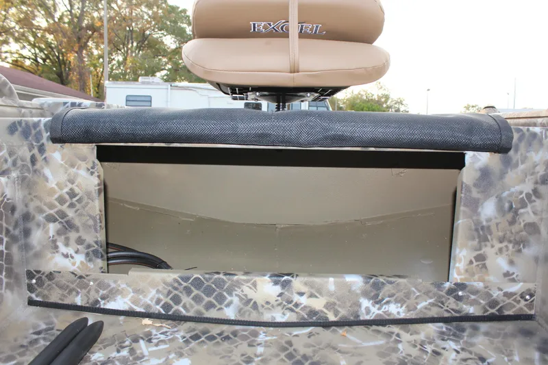 Slide: The Image of 2025 Excel 1860 F4 Shallow Water boat interior with camouflage design and seating. - 19