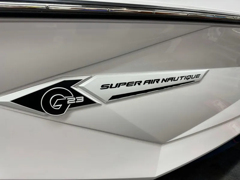 Slide: The Image of 2024 Nautique Super Air Nautique G23 logo on boat exterior. - 17