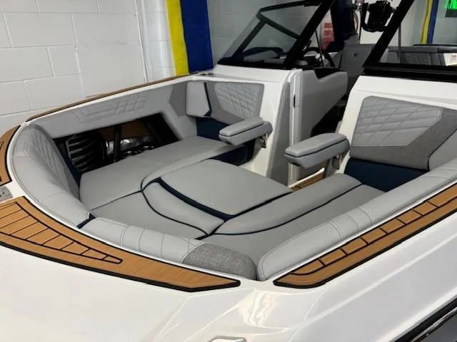 Slide: The Image of 2024 Nautique Super Air Nautique G23 interior with luxurious seating and modern design. - 5