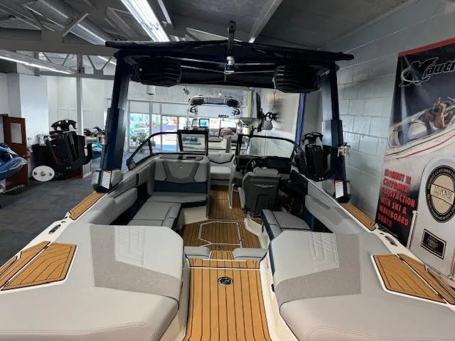 Slide: The Image of 2024 Nautique Super Air Nautique G23 interior with sleek seating and modern design. - 8
