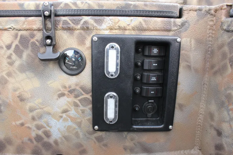 Slide: The Image of Control panel of Excel 1751 Viper F4, 2025 model, with fuel gauge and switches. - 14