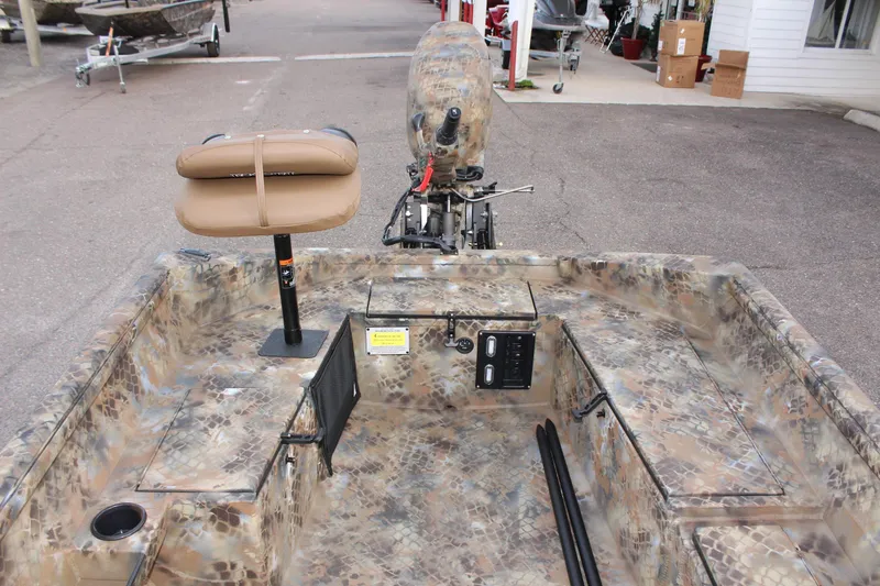 Slide: The Image of 2025 Excel 1751 Viper F4 boat with camouflage design and tan seat. - 19