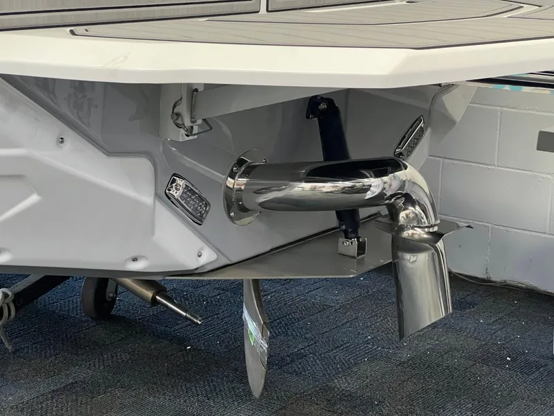 Slide: The Image of 2024 Nautique Super Air Nautique GS24 boat exhaust and propeller detail. - 12
