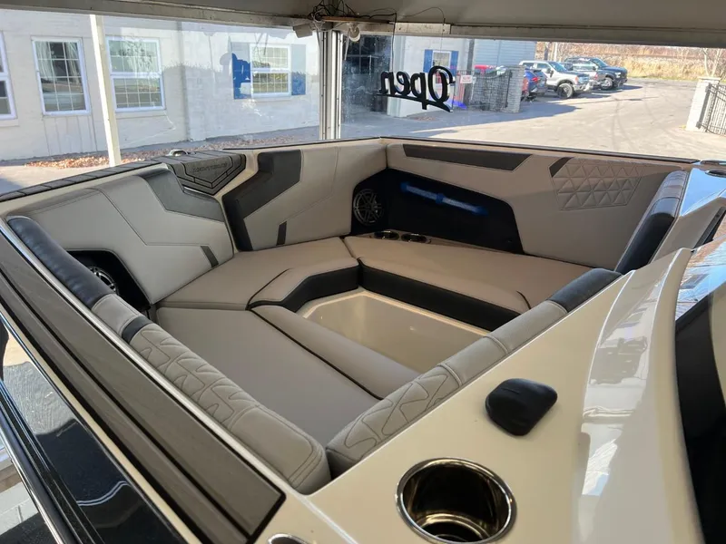 Slide: The Image of 2024 Nautique Super Air Nautique GS24 interior with luxurious seating and modern design. - 8