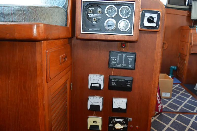 Slide: The Image of Control panel of a 1983 Albin Double Cabin boat with gauges and switches. - 31