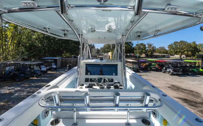 Slide: The Image of 2021 Contender 39 ST boat interior with advanced navigation system and sleek design. - 14