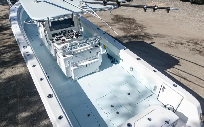 Slide: The Image of 2021 Contender 39 ST boat interior with spacious deck and modern console. - 15