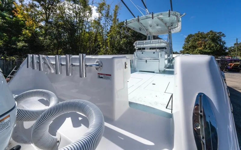 Slide: The Image of 2021 Contender 39 ST boat deck with rod holders and spacious layout. - 17