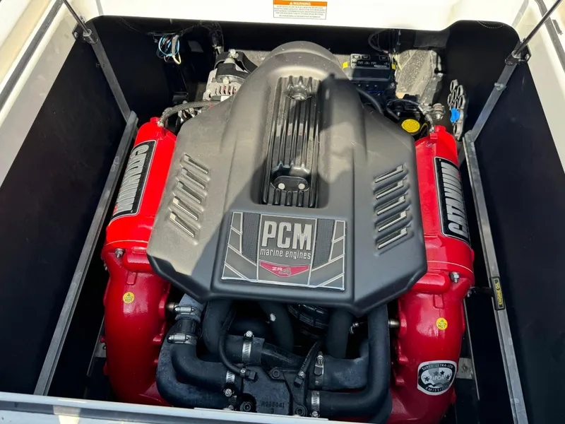 Slide: The Image of 2018 Nautique Super Air Nautique GS24 PCM engine with red accents. - 20